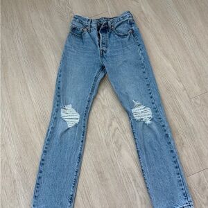 Levi's High-Rise Distressed Light Blue Jeans